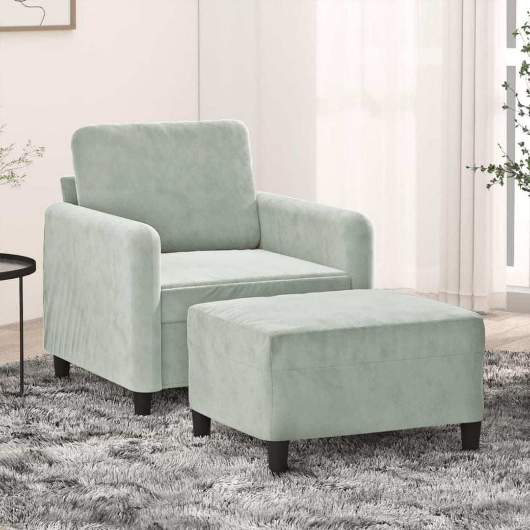 Divano confortevole grigio chiaro con poggiapiedi struttura in metallo